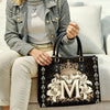 Uni The Divine Monogram Leather Bag